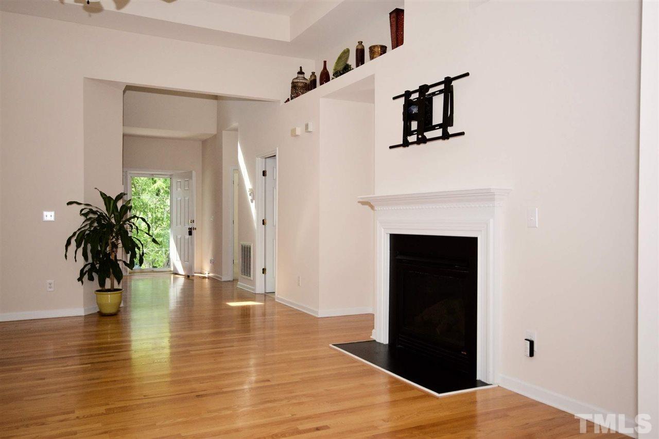157 Mickleson Ridge Drive Raleigh, NC 27603 - Photo 8 of 30 a view of a livingroom with a staircase