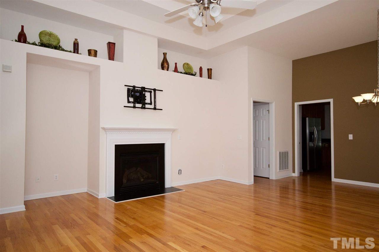 157 Mickleson Ridge Drive Raleigh, NC 27603 - Photo 9 of 30 a view of livingroom with furniture and fireplace
