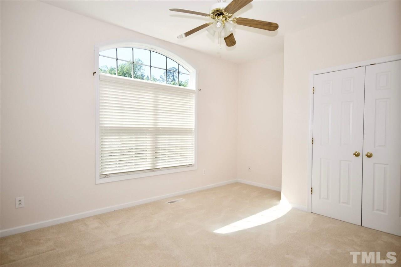 157 Mickleson Ridge Drive Raleigh, NC 27603 - Photo 10 of 30 a view of an empty room with a window