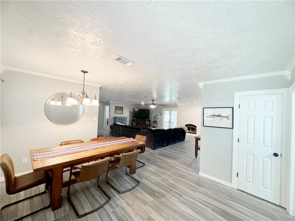 9462 Riley Green Road Franklin, TX 77856 - Photo 24 of 30 a room with furniture and wooden floor