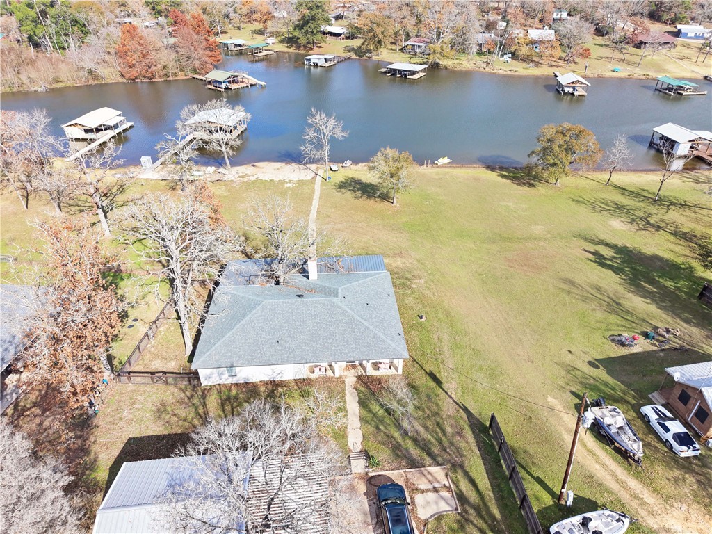 9462 Riley Green Road Franklin, TX 77856 - Photo 35 of 45 an aerial view of residential houses with outdoor space