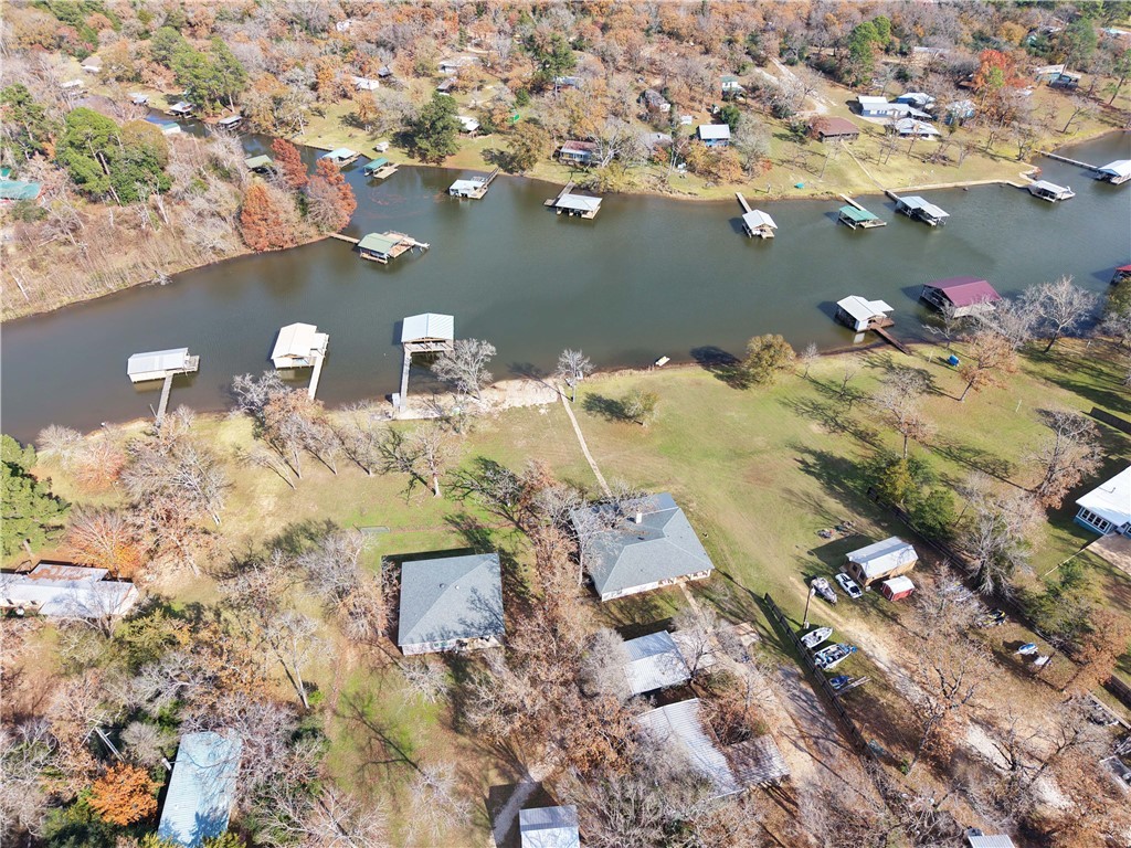 9462 Riley Green Road Franklin, TX 77856 - Photo 37 of 45 an aerial view of a house with a lake