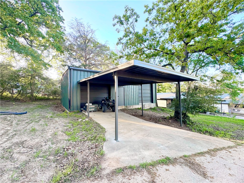 9462 Riley Green Road Franklin, TX 77856 - Photo 4 of 45 a view of a house with backyard porch and sitting area