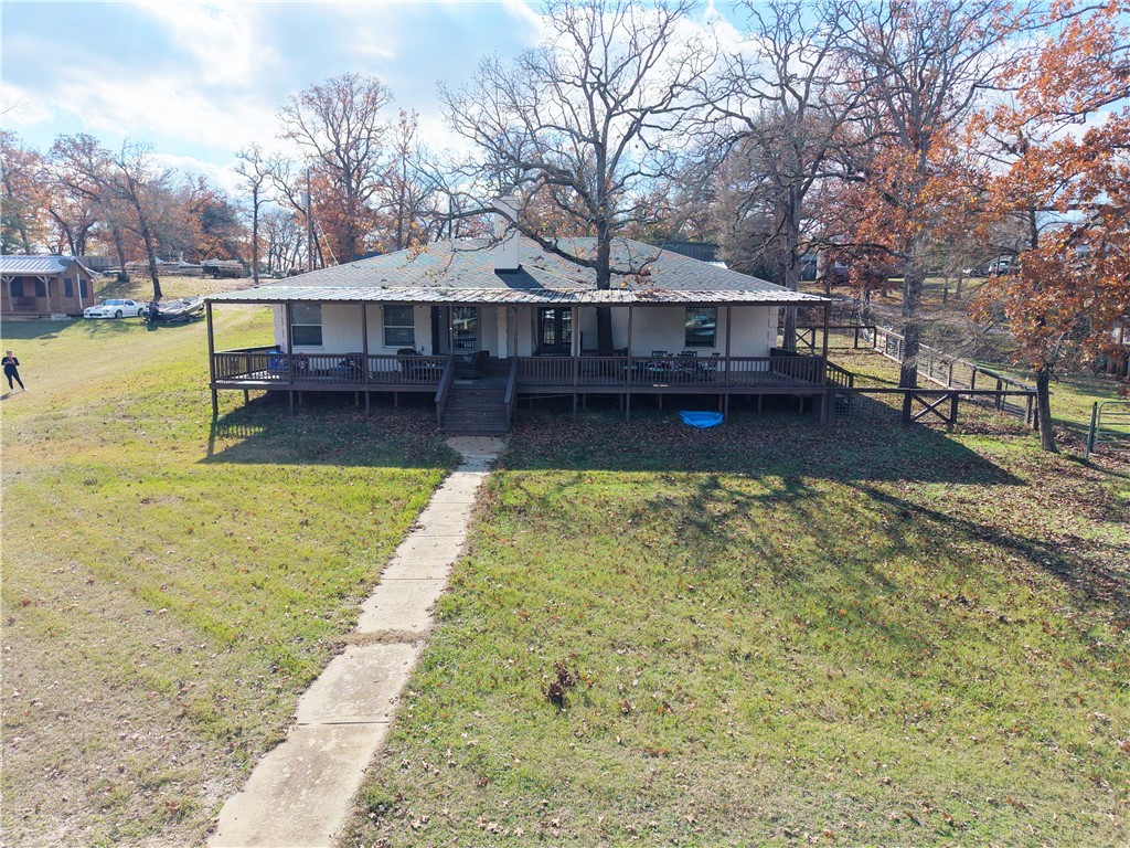 9462 Riley Green Road Franklin, TX 77856 - Photo 42 of 45 a view of a house with swimming pool