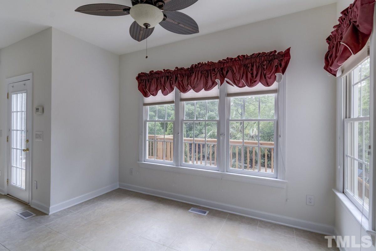 7913 Mayapple Place Raleigh, NC 27613 - Photo 9 of 20 a view of an entryway with a window