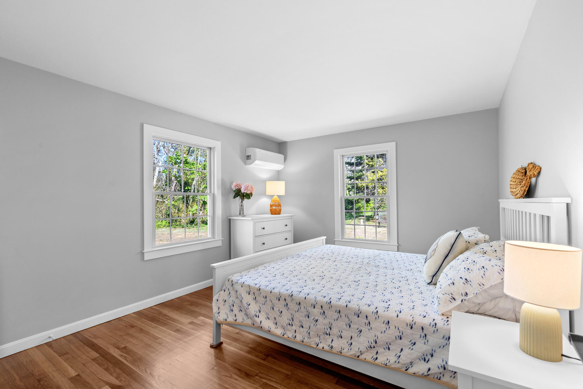 1295 Massasoit Road Eastham, MA 02642 - Photo 23 of 32 a bedroom with a bed and a window