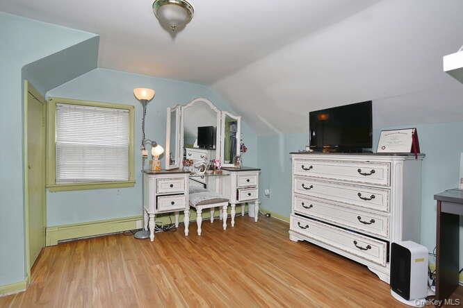 161 McNamara Road Spring Valley, NY 10977 - Photo 22 of 38 a view of a livingroom with furniture and a flat screen tv