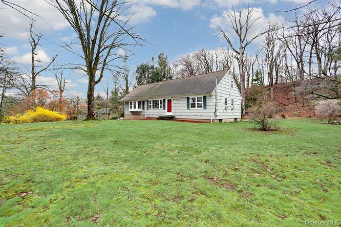 161 McNamara Road Spring Valley, NY 10977 - Photo 3 of 38 a view of house with outdoor space and garden