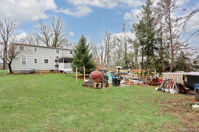 161 McNamara Road Spring Valley, NY 10977 - Photo 38 of 38 a view of a house with backyard and sitting area