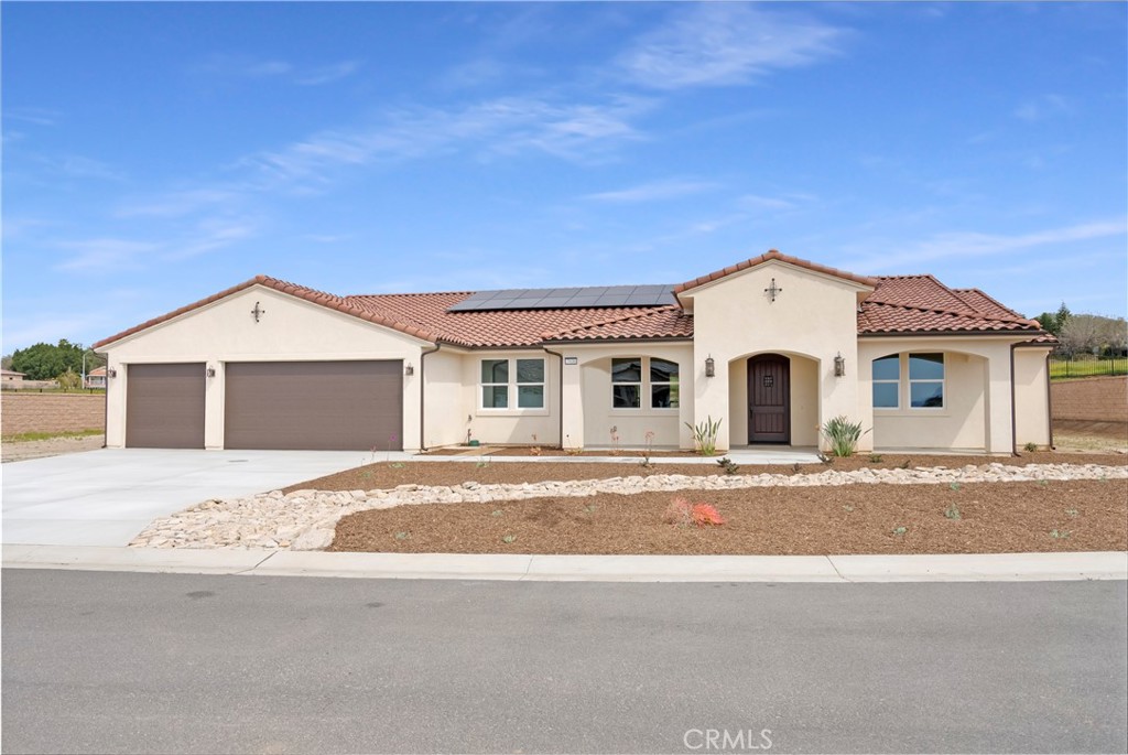 7938 Featherstone Court Riverside, CA 92506 - Photo 1 of 1 a view of a house with a yard and garage