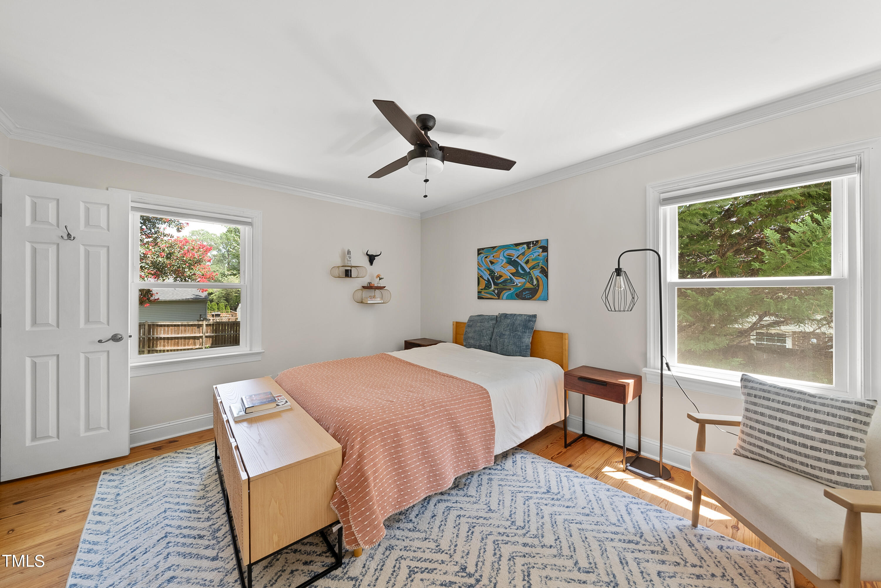 3116 Carovel Court Raleigh, NC 27612 - Photo 15 of 25 a bedroom with a bed and a window