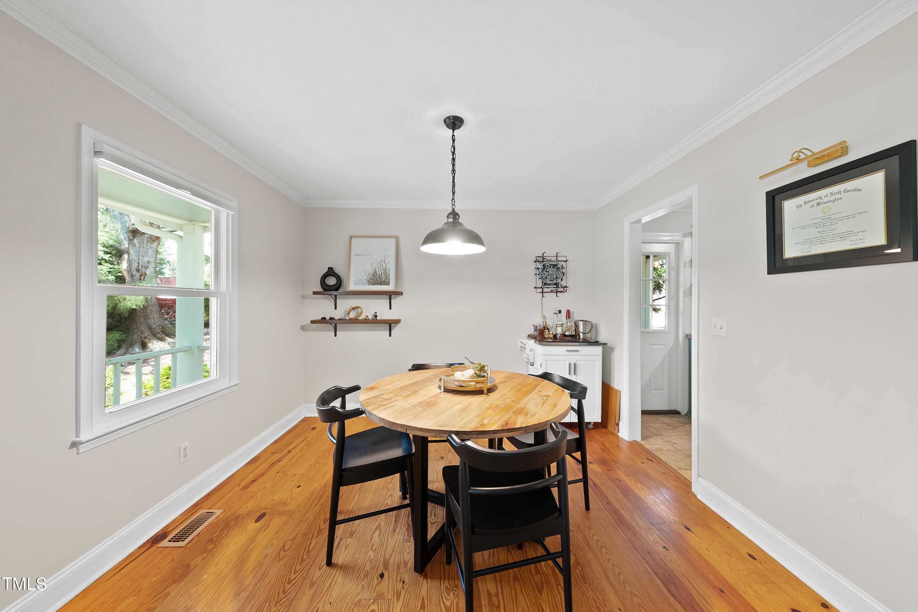 3116 Carovel Court Raleigh, NC 27612 - Photo 5 of 25 a dining room with furniture and window