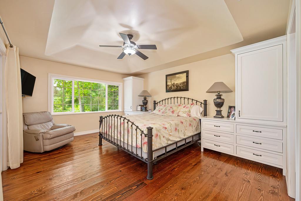 3557 Val Verde Road Loomis, CA 95650 - Photo 26 of 71 a bedroom with a large bed and a window