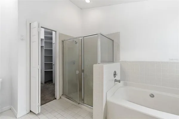 a view of an empty walk in closet