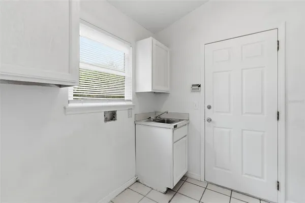 a view of a house with a sink and a window