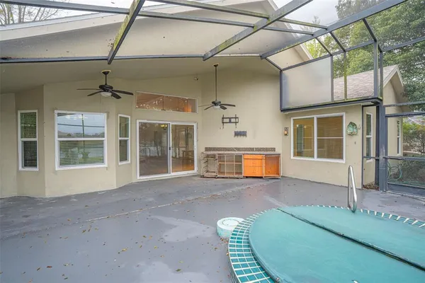 a view of a swimming pool with a porch