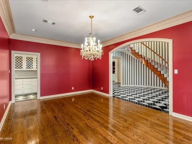 a view of livingroom with window and wooden floor