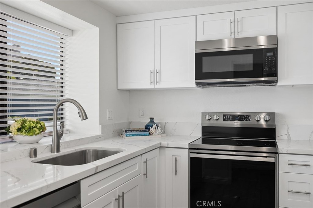 2031 Via Concha San Clemente, CA 92673 - Photo 5 of 29 a kitchen with a stove and a sink