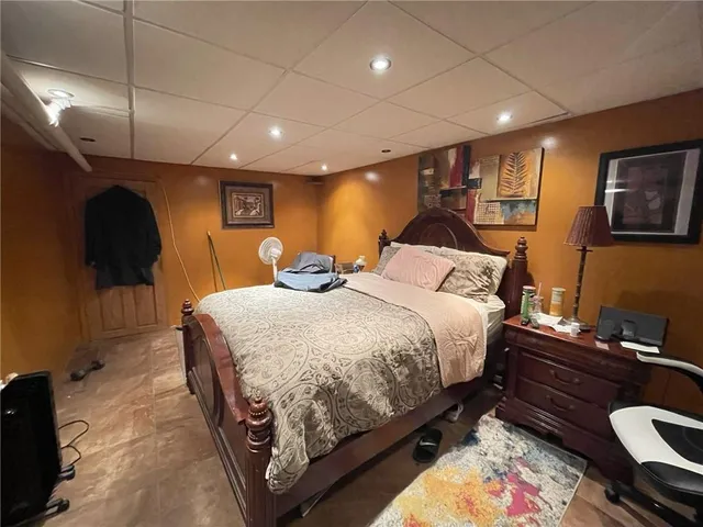 a kitchen with a sink appliances and cabinets