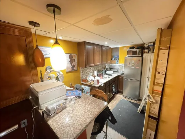 a room with a bed and a window