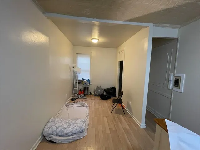 a room with furniture and a flat screen tv