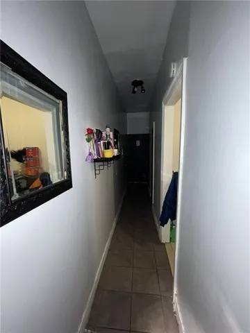 a kitchen with a counter space cabinets and appliances
