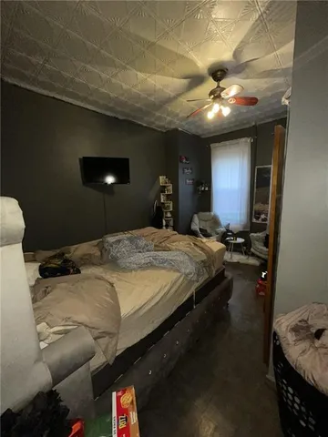 a kitchen with a stove a microwave and a refrigerator