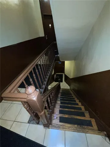 a bathroom with a bathtub a sink and a shower