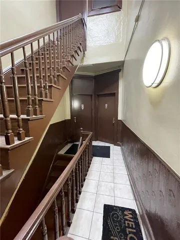 a room with furniture and a flat screen tv