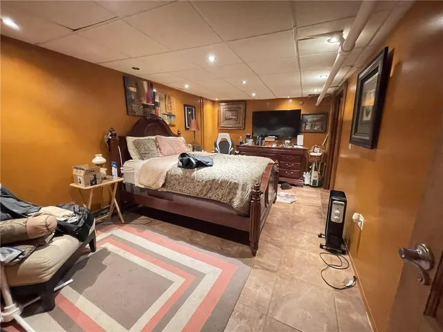 a view of a livingroom with furniture and toys