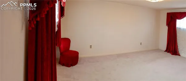 a spacious bathroom with a double vanity sink mirror and shower