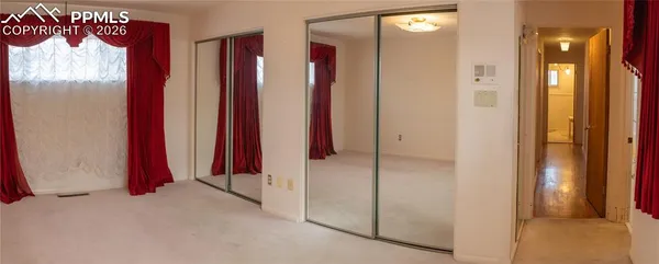 a bathroom with a sink a vanity and a mirror