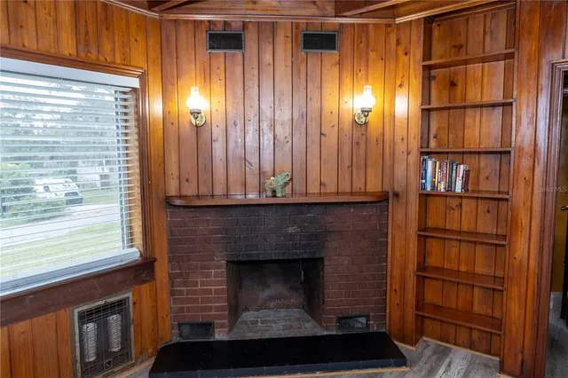 a view of a livingroom with furniture and staircase