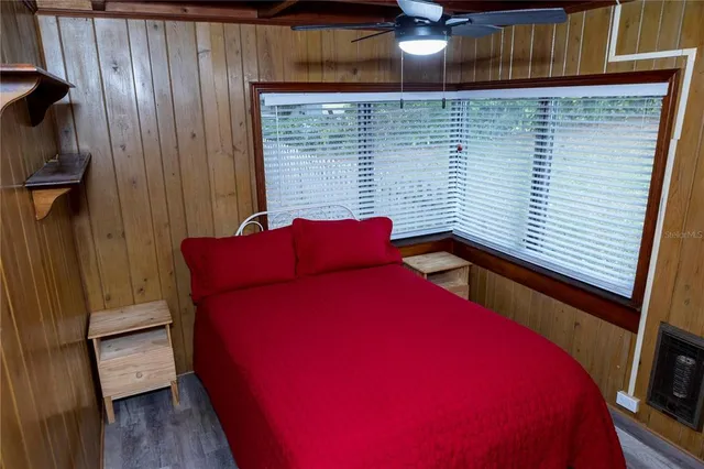 a view of balcony with wooden floor