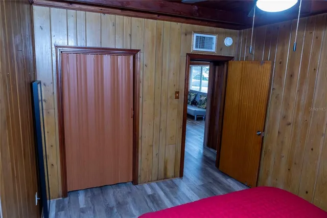 a view of front door with wooden floor
