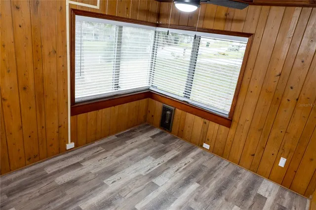 a view of a room with a window