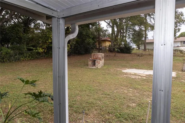 a view of a glass door and porch