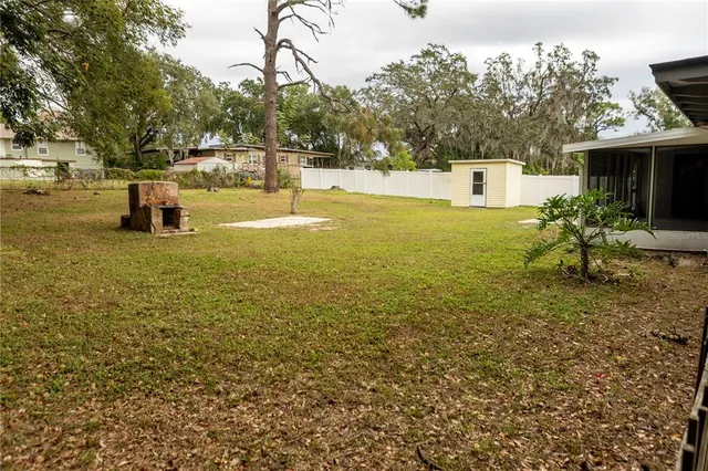 a view of a yard with an outdoor space
