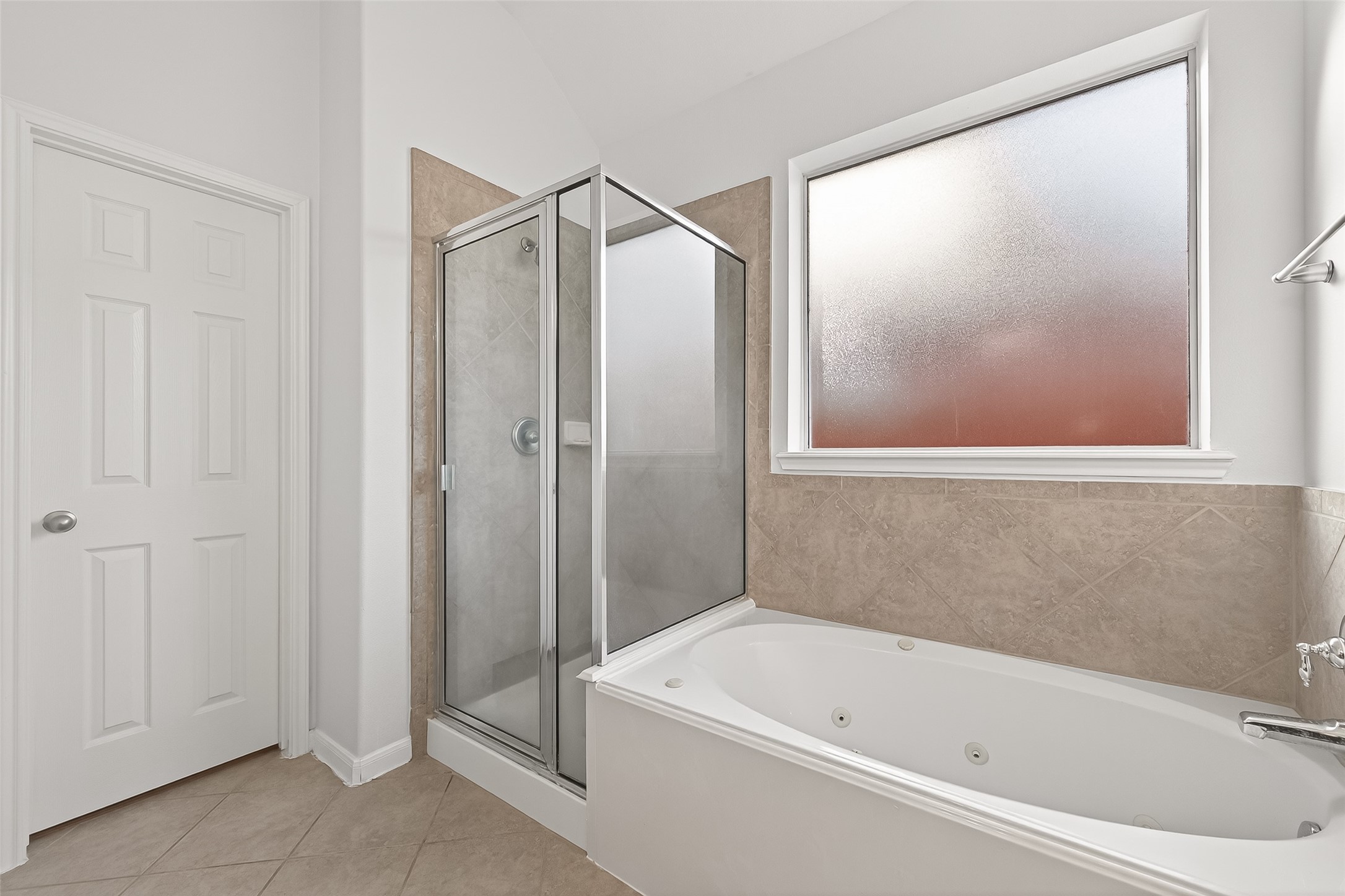 5103 Azalea Meadow Lane Katy, TX 77494 - Photo 15 of 34 a bathroom with a bathtub and a shower