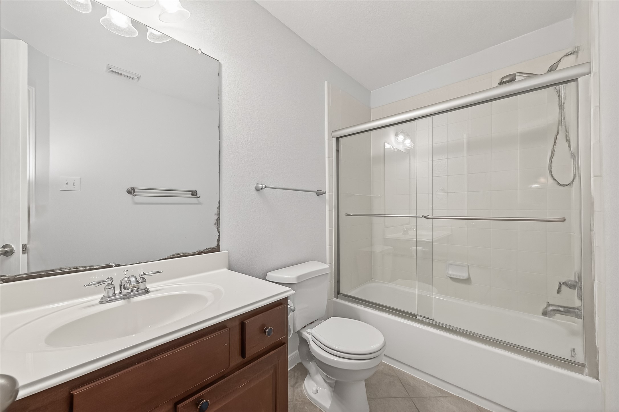 5103 Azalea Meadow Lane Katy, TX 77494 - Photo 17 of 34 a bathroom with a sink toilet and shower