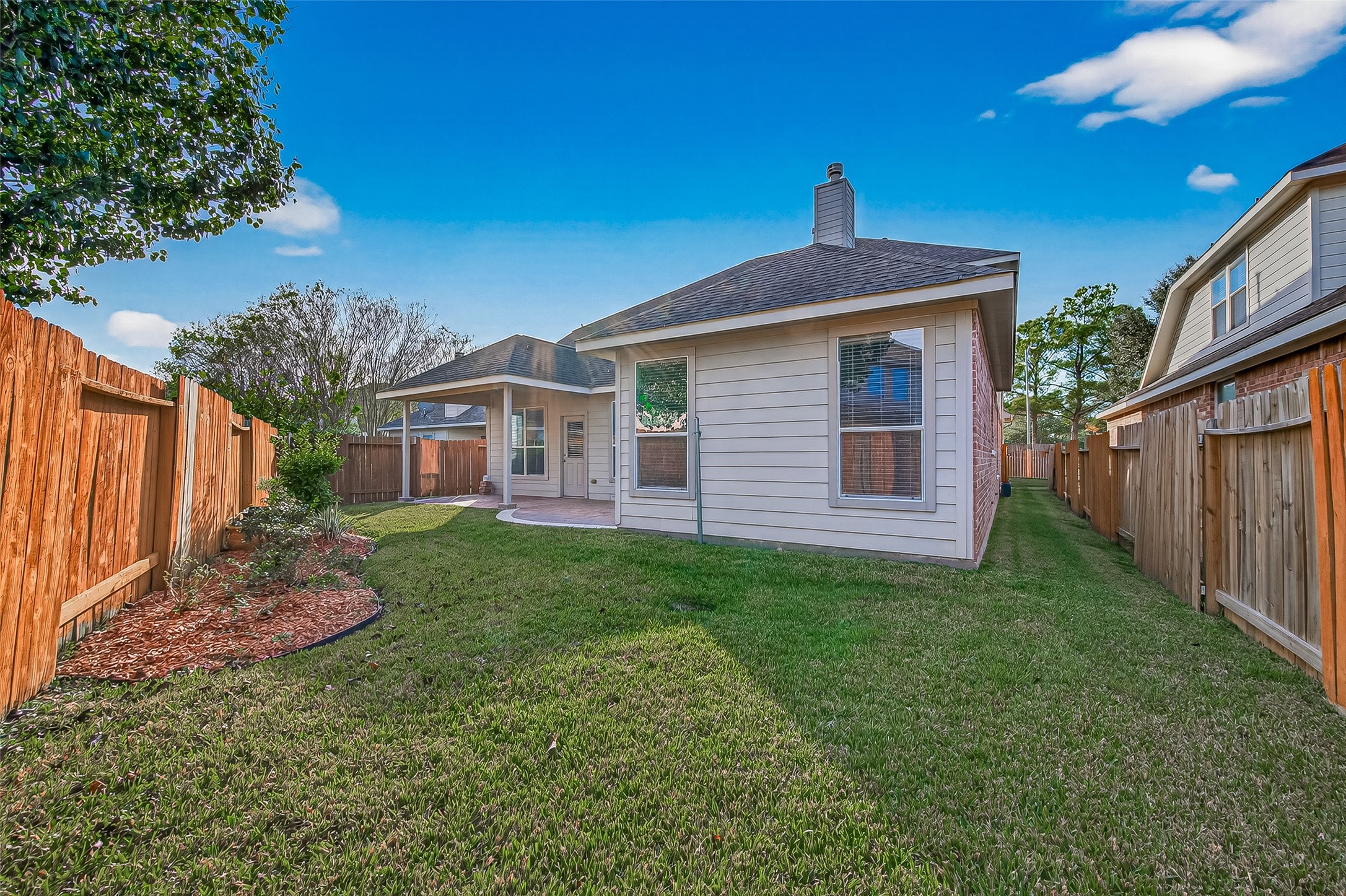 5103 Azalea Meadow Lane Katy, TX 77494 - Photo 18 of 34 a front view of a house with a yard