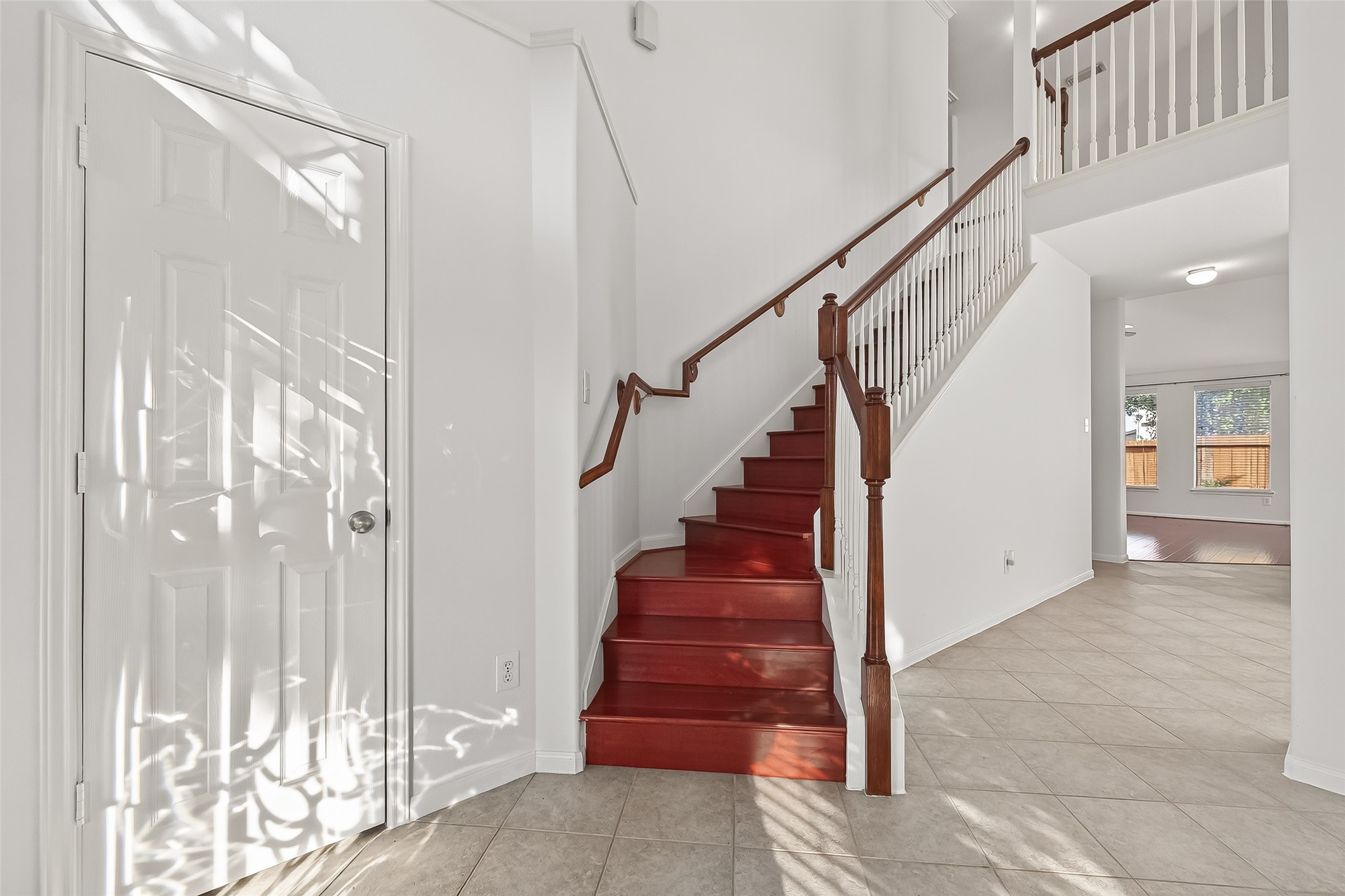 5103 Azalea Meadow Lane Katy, TX 77494 - Photo 3 of 34 a view of entryway and hall with wooden floor