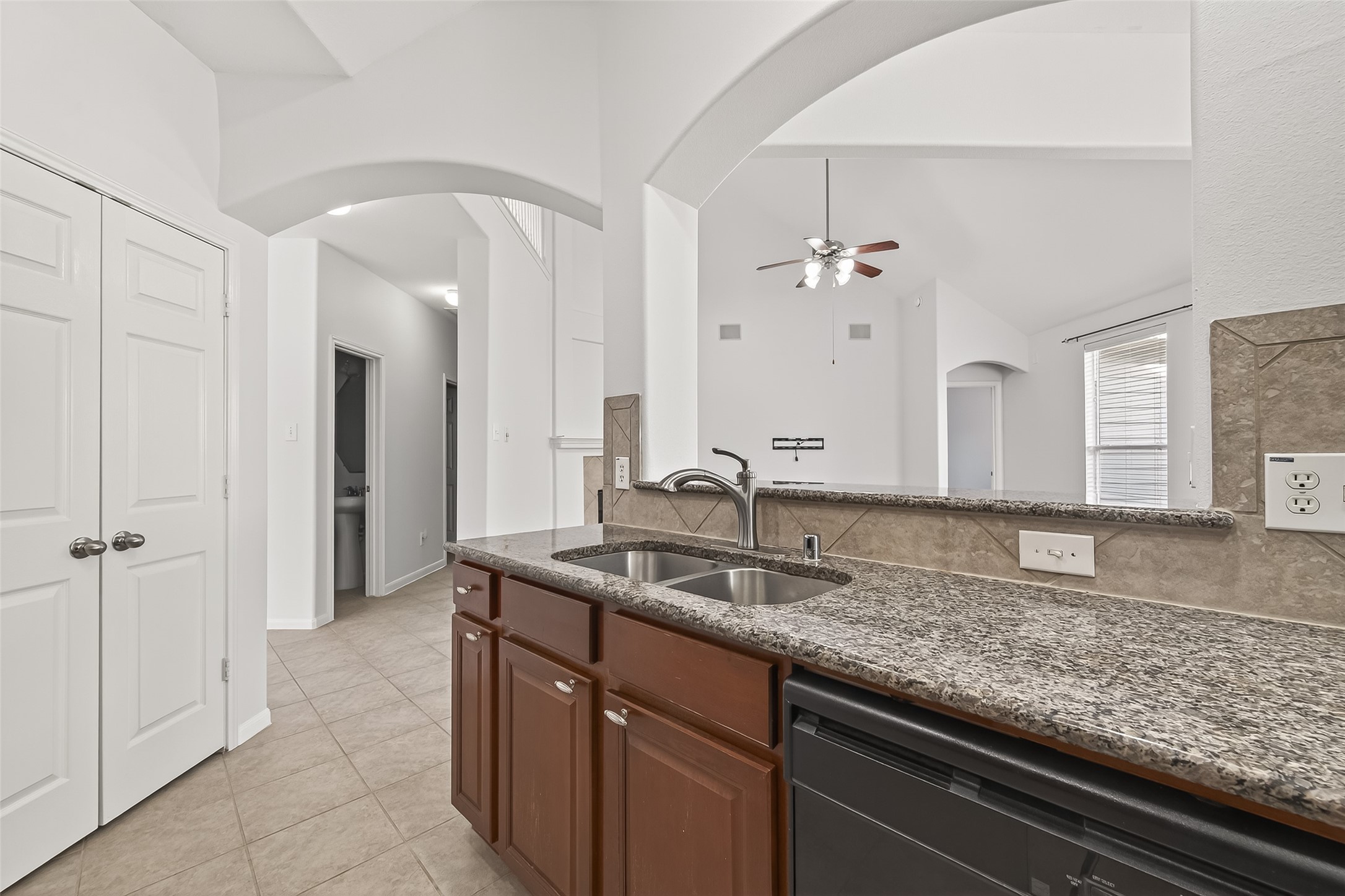 5103 Azalea Meadow Lane Katy, TX 77494 - Photo 10 of 34 a bathroom with a granite countertop sink and a mirror