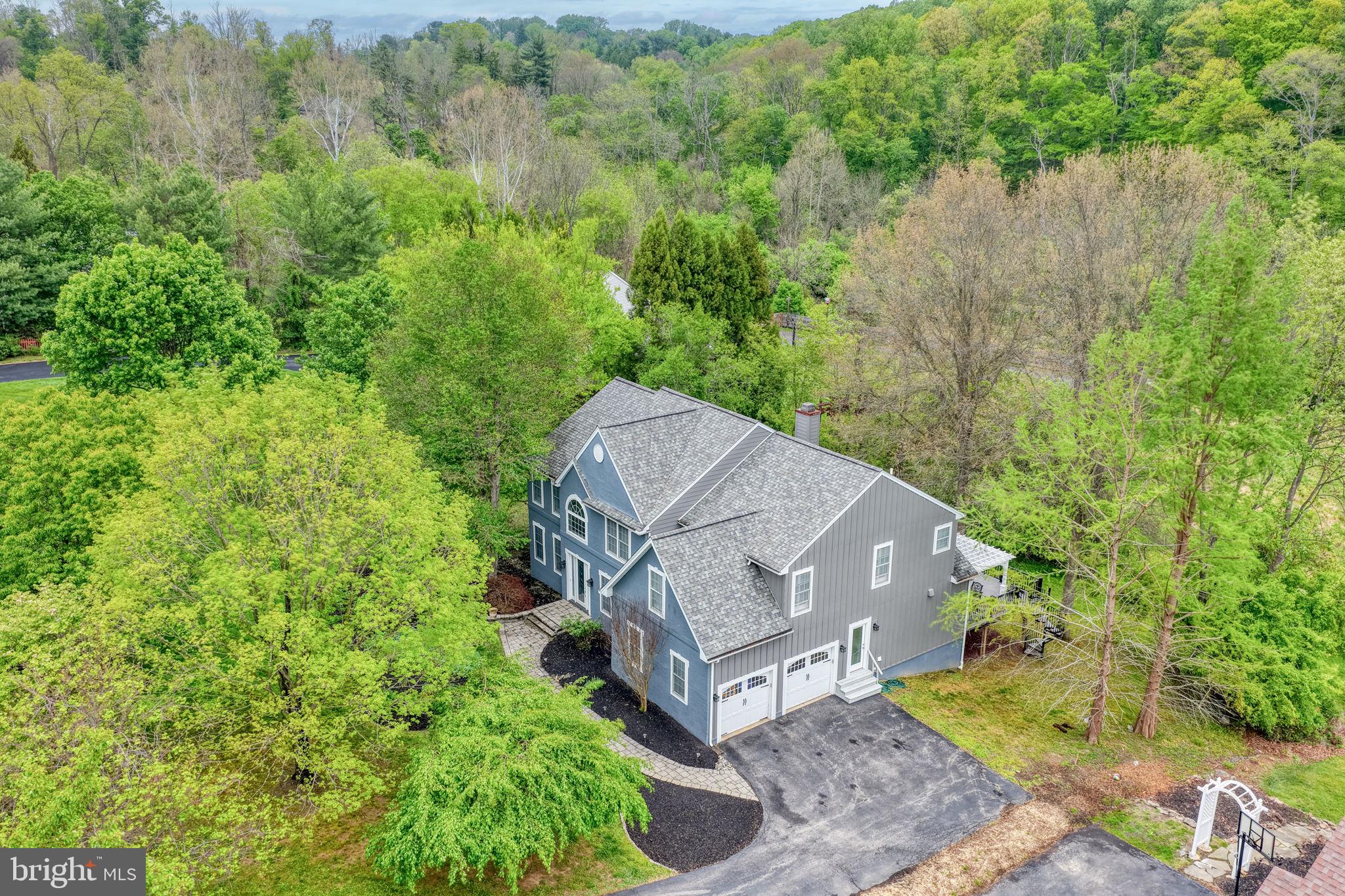 357 Willits Way Garnet Valley, PA 19060 - Photo 61 of 63 an aerial view of a house with a yard and large tree