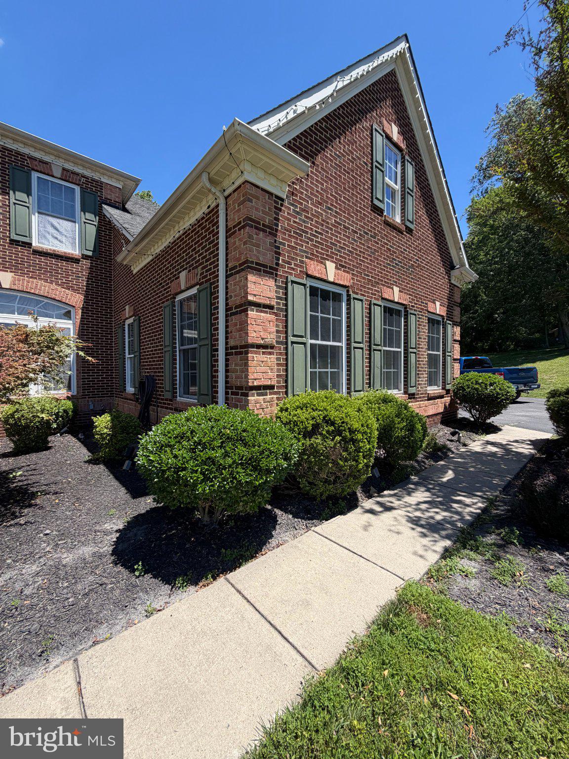 18724 Brooke Road Brinklow, MD 20862 - Photo 45 of 52 Charming brick home with lush greenery.
