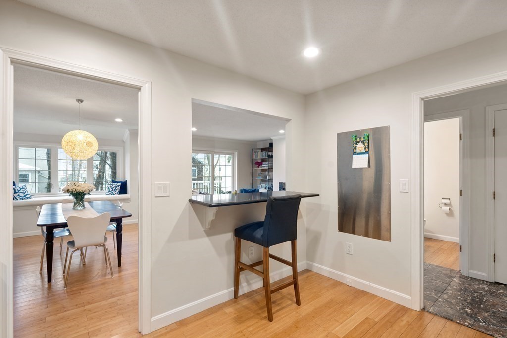 160 Pine Street, Unit 27 Newton, MA 02466 - Photo 7 of 30 a view of a a dining room with furniture window and wooden floor