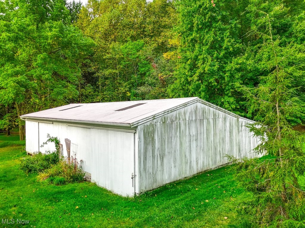 2980 Luli Road Mogadore, OH 44260 - Photo 9 of 50 View of outdoor structure with a lawn