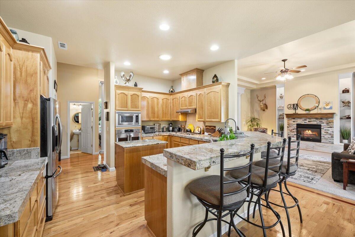 1105 Pumpkin Ridge Eagle Point, OR 97524 - Photo 2 of 40 a view of a dining room kitchen and a window