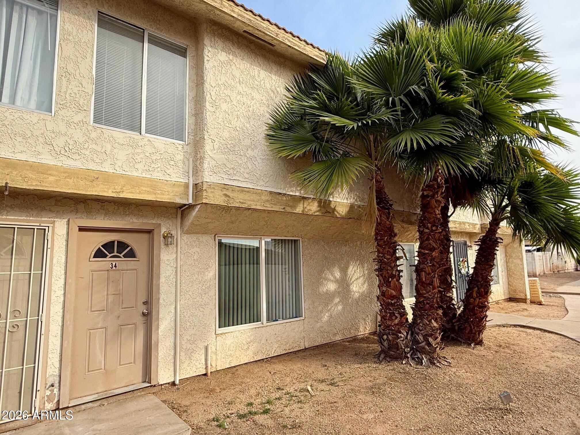 3840 North 43rd Avenue, Unit 34 Phoenix, AZ 85031 - Photo 1 of 18 a view of a backyard