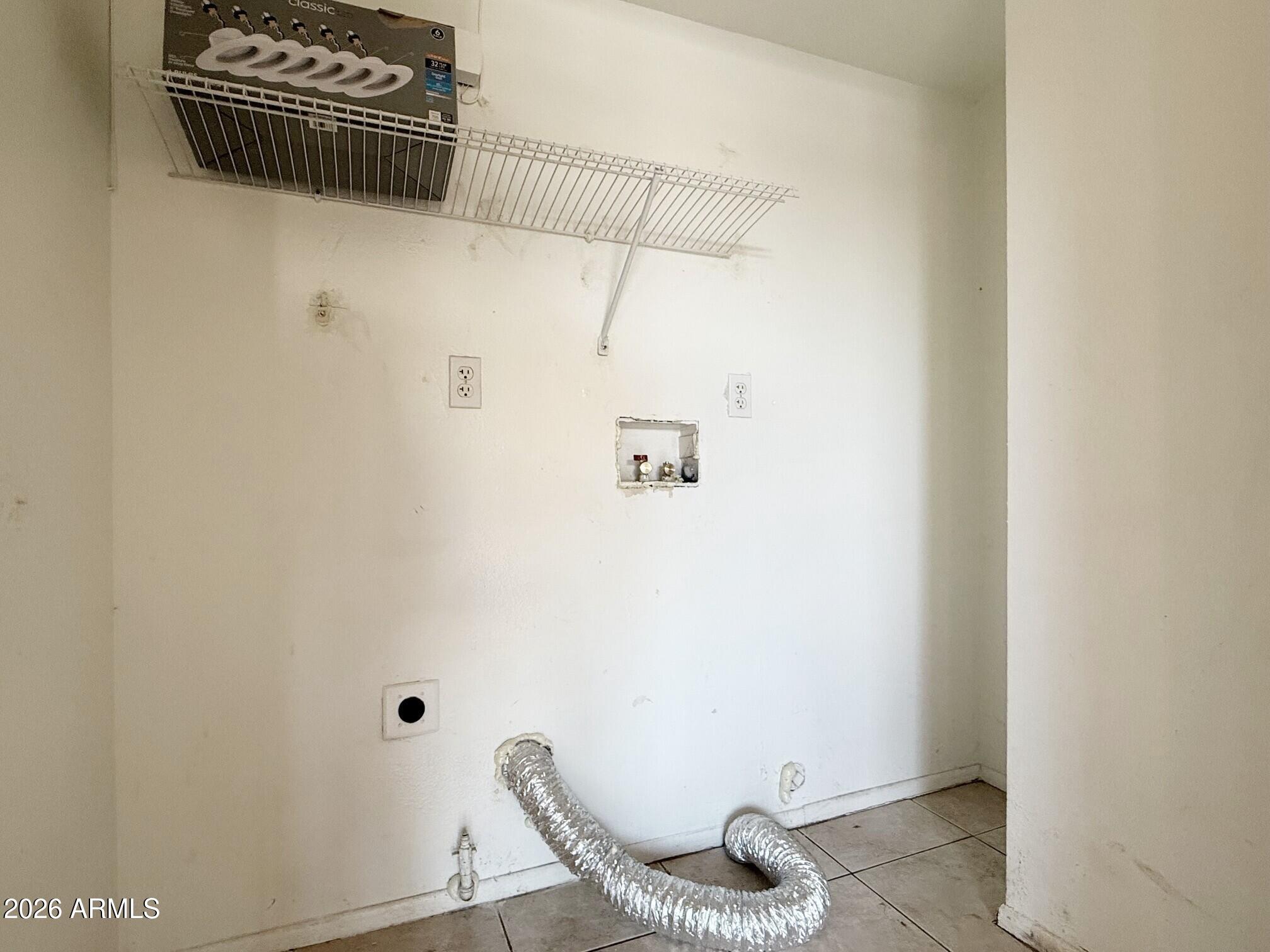 3840 North 43rd Avenue, Unit 34 Phoenix, AZ 85031 - Photo 16 of 18 a view of a bathroom with a shower